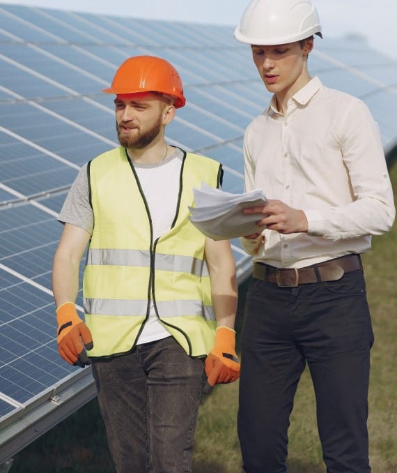foreman-and-businessman-at-solar-energy-station foreman-and-businessman-at-solar-energy-station